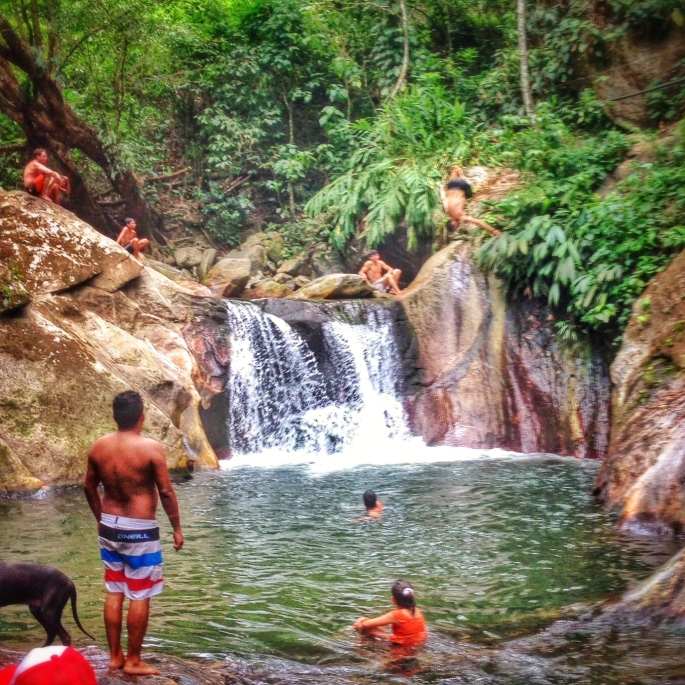 Flipping into waterfalls in Minca.